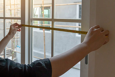 Measuring a window for shutter installation