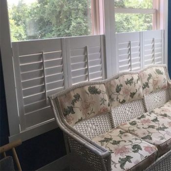 Window Shutters on a living room window